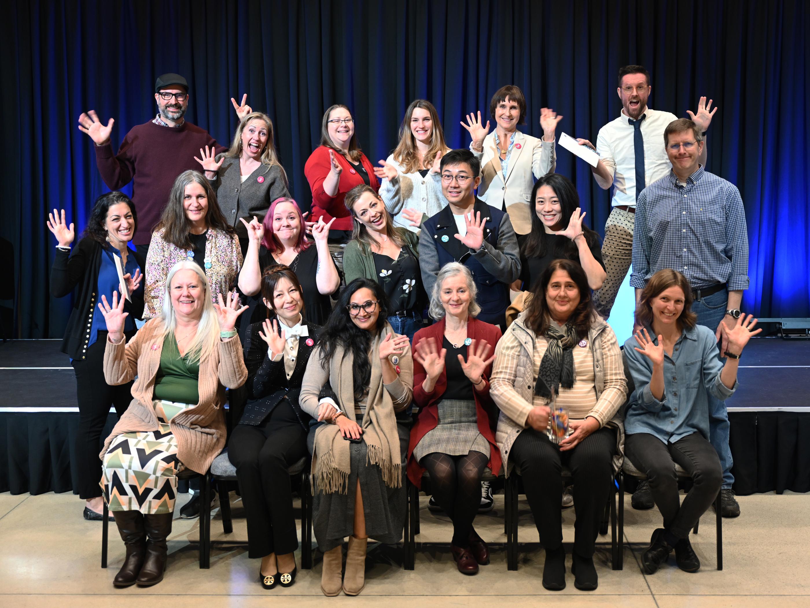 Employees celebrating service milestones at the 2024 Celebrating U event.