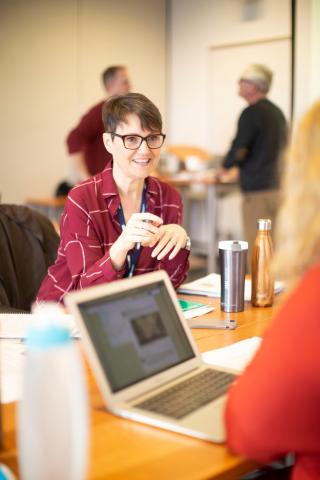 Person-talking-at-front-desk