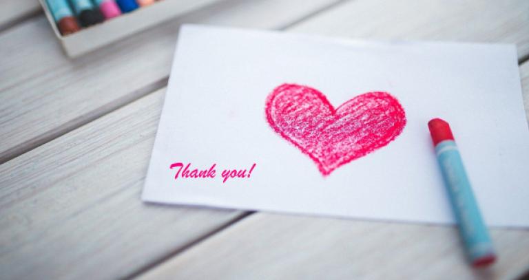 Picture of card with a heart on it and the word Thanks!