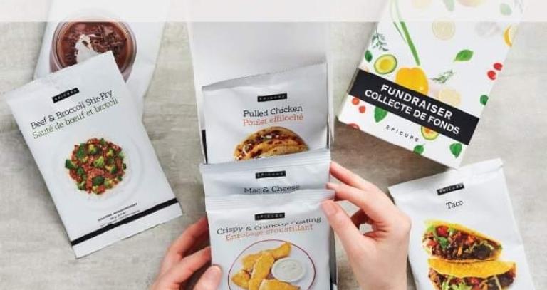 Person holding cooking spices.